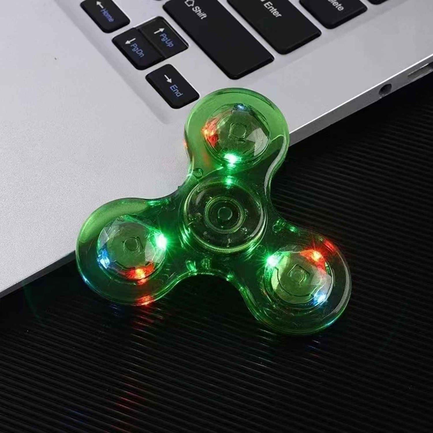 LED Finger Spinner – färgglad snurrleksak med ljus