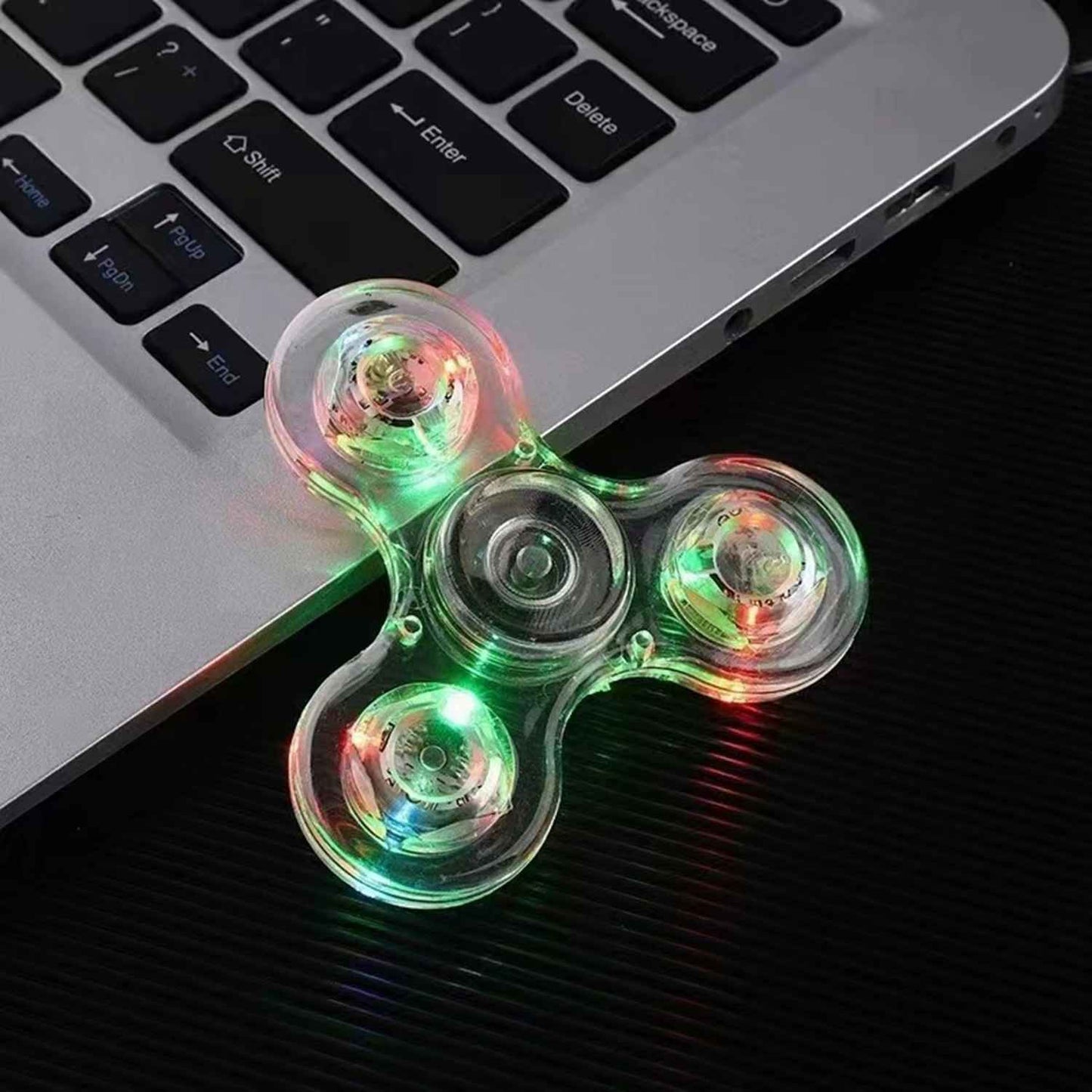 LED Finger Spinner – färgglad snurrleksak med ljus